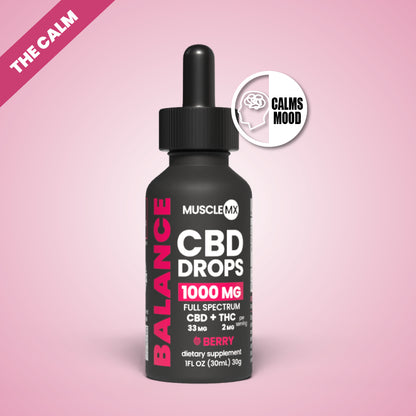 A bottle of MuscleMX Balance CBD Drops with a dropper, labeled as having 1000 mg full spectrum CBD and 2mg THC