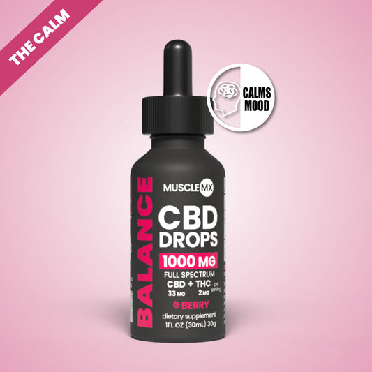 A bottle of MuscleMX Balance CBD Drops with a dropper, labeled as having 1000 mg full spectrum CBD and 2mg THC